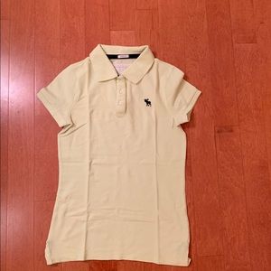 Abercrombie and Fitch polo collared shirt, pastel yellow, size medium